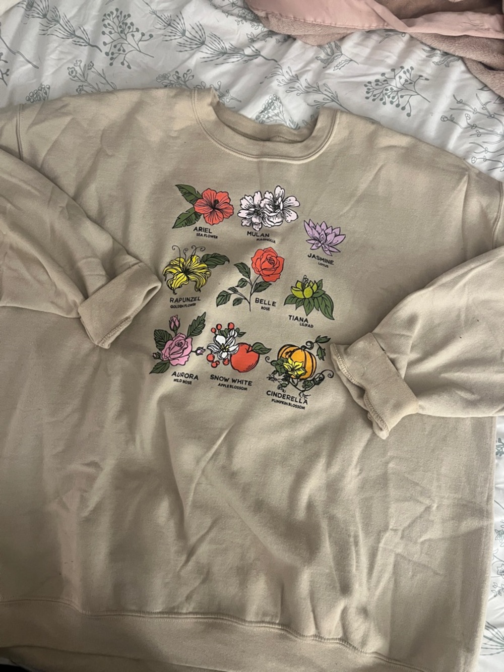 Beige Floral Graphic Sweatshirt with Colorful Disney Princess Flower Motifs